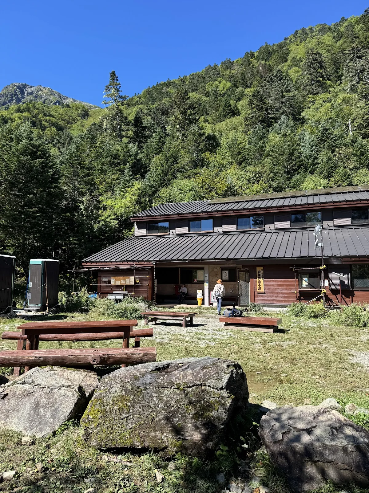 Mountain hut in a green valley